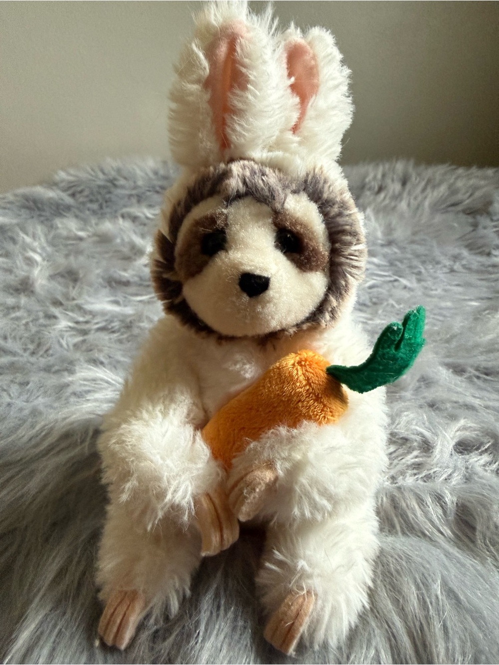 Sloth in bunny suit plush